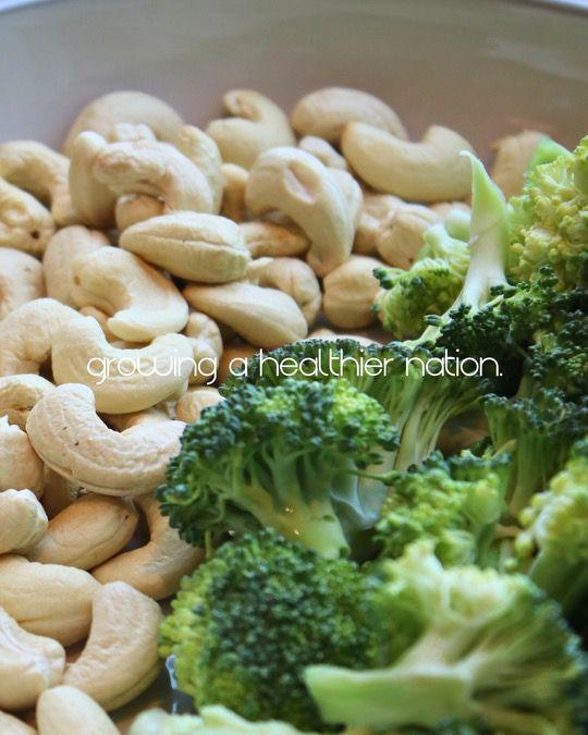 Close-up of raw cashew nuts, highlighting their health benefits including heart health, weight management, and improved skin and hair